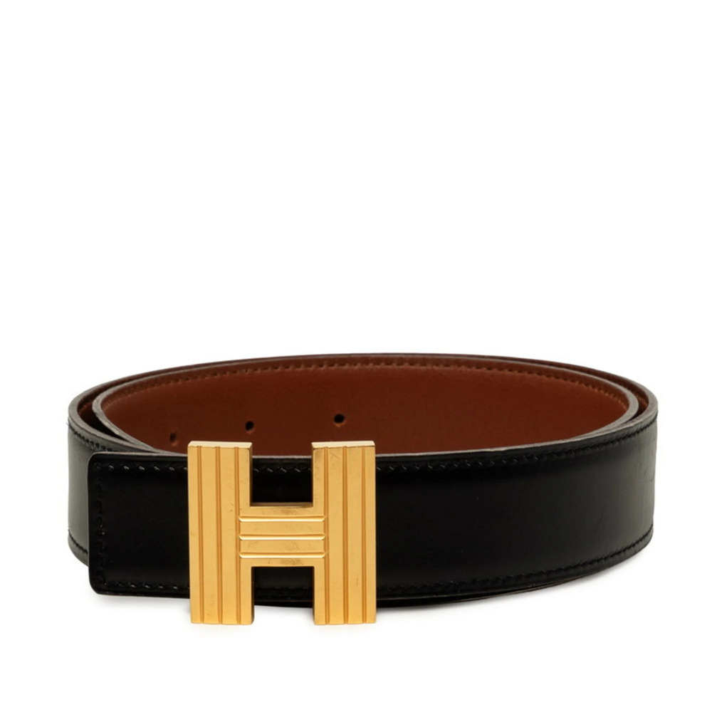Hermes H-buckle reversible belt, size 70, stamped □D, black and gold leather,...